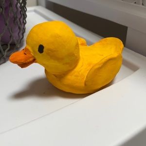 Hand made pottery duckling. Yellow and orange. Decor.